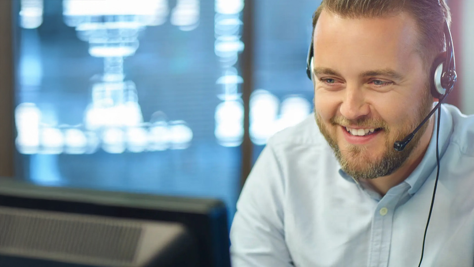 Person using a modern phone for unified communications